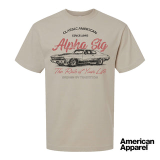 Beige T-shirt displayed on a plain background with a vintage-inspired graphic of a classic muscle car, mixed typography, and a soft red and black print design.