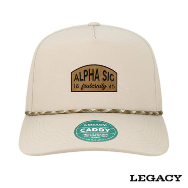 Cream Legacy brand rope hat featuring a brown fraternity patch, designed for stylish fraternity apparel and casual campus wear.